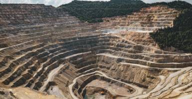 Mining site with trucks and machinery